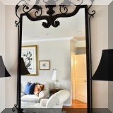 D07. John Richard wrought iron scrollwork mirror. 64”h x 38”w 